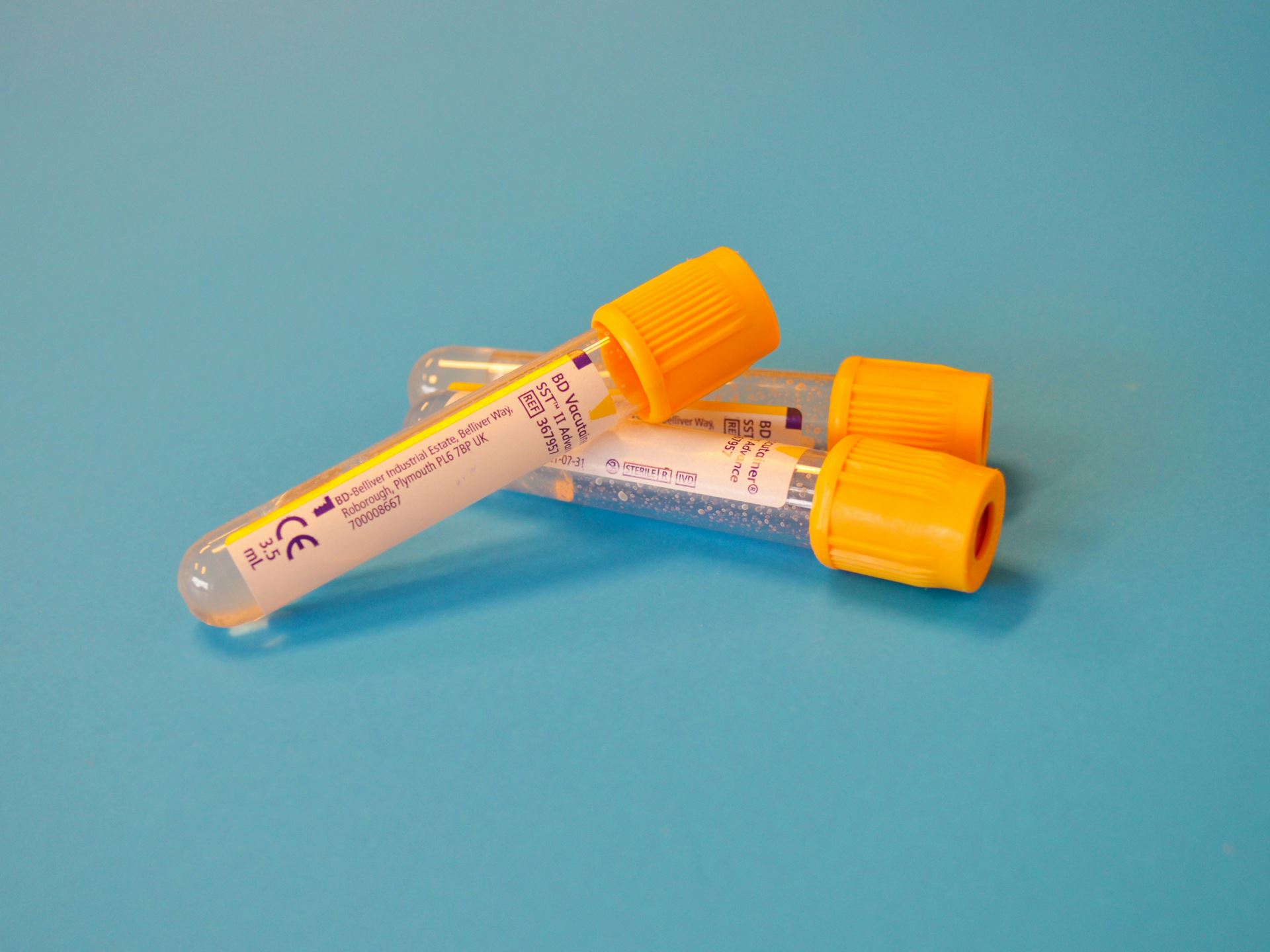 an image of blood test bottles